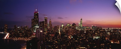 Buildings lit up at dusk, Chicago, Illinois