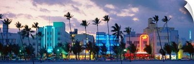 Buildings lit up at dusk, Ocean Drive, Miami Beach, Florida