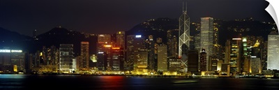 Buildings lit up at night, Hong Kong, China