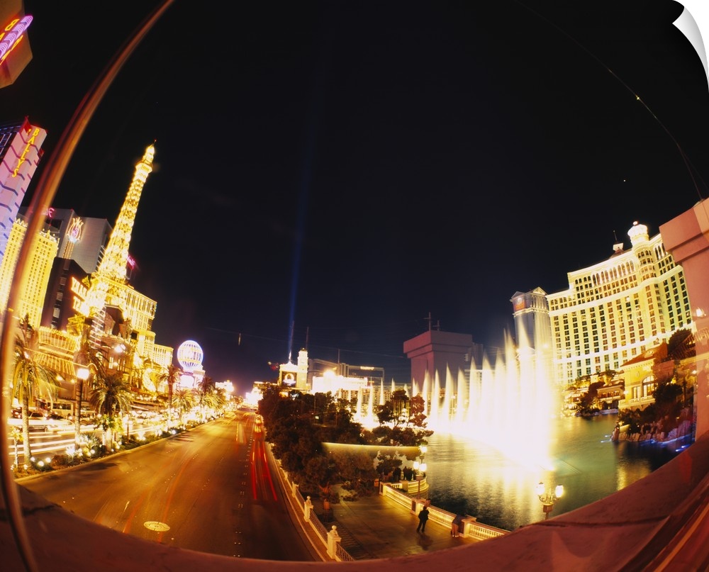 Big photograph of downtown Las Vegas, Nevada (NV) lit up at night.