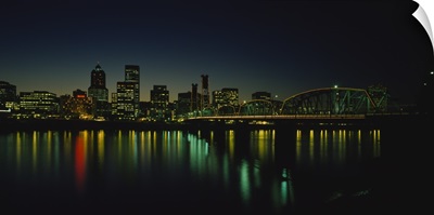 Buildings lit up at night, Willamette River, Portland, Oregon