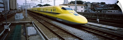 Bullet train moving on railroad track, Shin Yokohama Station, Yokohama