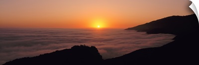 California, Big Sur, Pacific Ocean, Sunset with marine layer