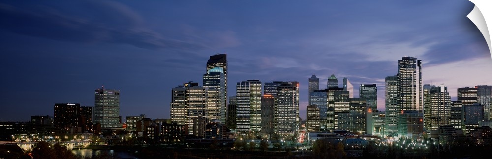 Canada, Alberta, Calgary, Crescent Drive, Skyscrapers in a city at sunset