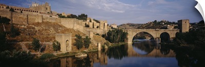Castle at the waterfront, Puente de San Martin, Tajo River, Toledo, Spain