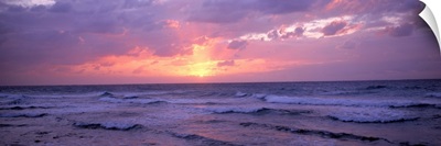 Cayman Islands, Grand Cayman, 7 Mile Beach, Caribbean Sea, Sunset over waves