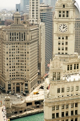 Clock tower along a river, Wrigley Building, Chicago River, Chicago, Illinois