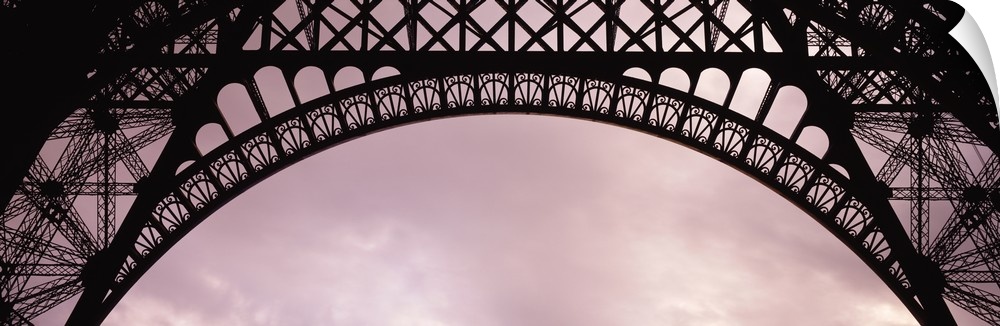 One of the arches at the bottom of the Eiffel Tower is pictured in panoramic view.