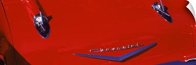 Close-up of a hood ornament of a 57 Chevy car