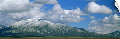Clouds over snowcapped mountains, Taos, New Mexico