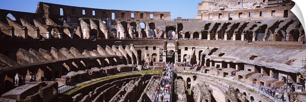 Wide angle picture taken inside the infamous coliseum in Rome.
