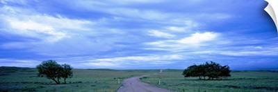 Country road passing through a landscape, Kansas