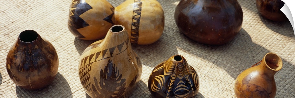 Decorated gourds named Ipu used as Hula rhythm instruments on a mat, Puuhonua o Honaunau National Historical Park, Honauna...