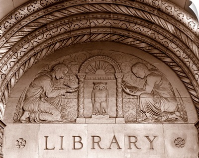 Detail of carvings on the wall of Powell Library, University of California, LA, CA