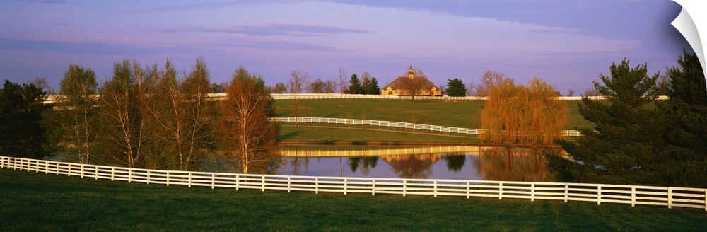 Panoramic photograph of a horse farm and pond in Kentucky available as wall art for the home or office.