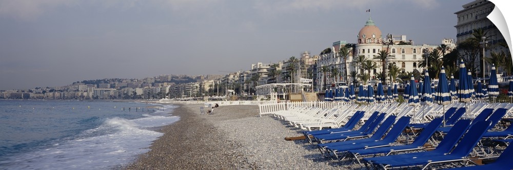 Empty lounge chairs on the beach, Nice, French Riviera, France