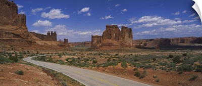 Empty road running through a national park, Arches National Park, Utah