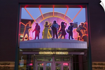 Facade of a museum lit up at dusk, American Jazz Museum, Kansas City, Missouri