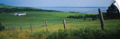 Fence in a field, Charlevoix, Quebec, Canada