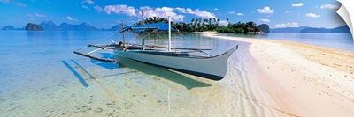 Fishing boat moored on the beach, Palawan, Philippines