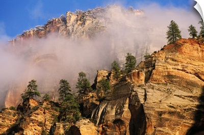 Fog Over Sandstone Cliffs