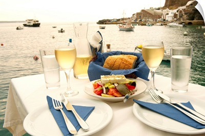 Food on a table at the seaside, Ammoudia, Santorini, Cyclades Islands, Greece