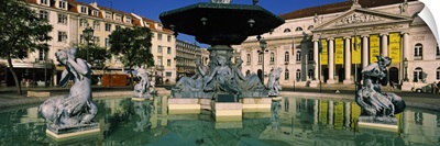 Fountain in front of an opera house, Praca Rossio, National Theatre Dona Maria II, Lisbon, Portugal