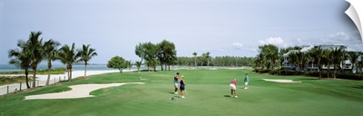 Four people playing golf, South Seas Plantation, Captiva Island, Florida