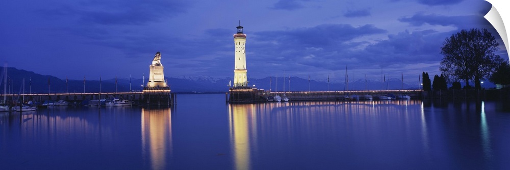 Germany, Lindau, Reflection of Lighthouse in the lake Constance