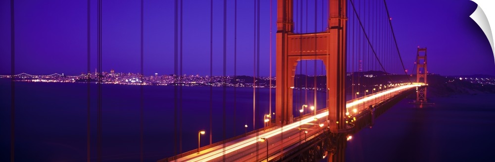 Twilight and red hue of the Golden Gate Bridge in San Francisco, California.