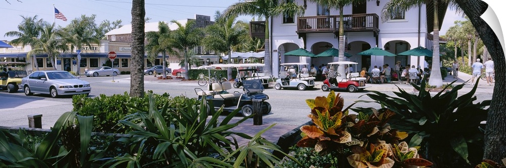 Golf carts and cars parked on a street, Boca Grande, Gasparilla Island, Florida
