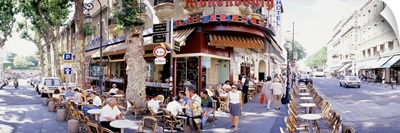 Group of people at a sidewalk cafe Paris France
