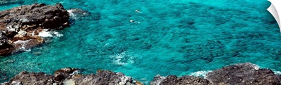 Hawaii, Oahu, Aerial view of two people swimming in the ocean