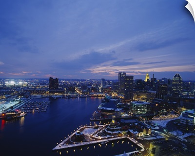 High angle view of a city lit up at dusk, Baltimore, Maryland