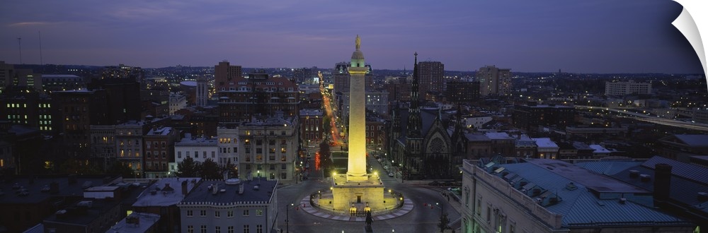 View from above of the Washington Monument lit up in Baltimore, Maryland.