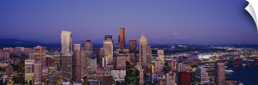 High angle view of buildings lit up at dusk, Seattle, Washington State