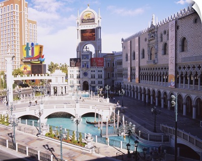 High angle view of footbridge over a pond in front of buildings, Venetian Hotel, Treasure Island Hotel And Casino, Las Vegas, Nevada