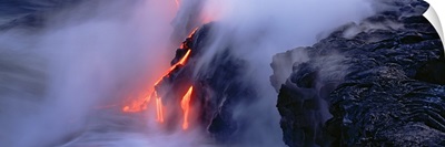 High angle view of lava flowing into the Pacific Ocean, Volcano National Park, Hawaii