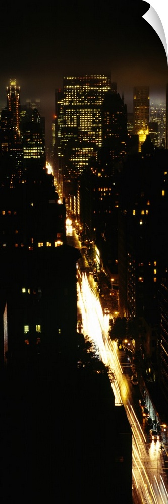 High angle view of skyscrapers lit up at night, Manhattan, New York City, New York State