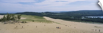 High angle view of tourists climbing sand dunes, Sleeping Bear Dunes National Lakeshore, Michigan
