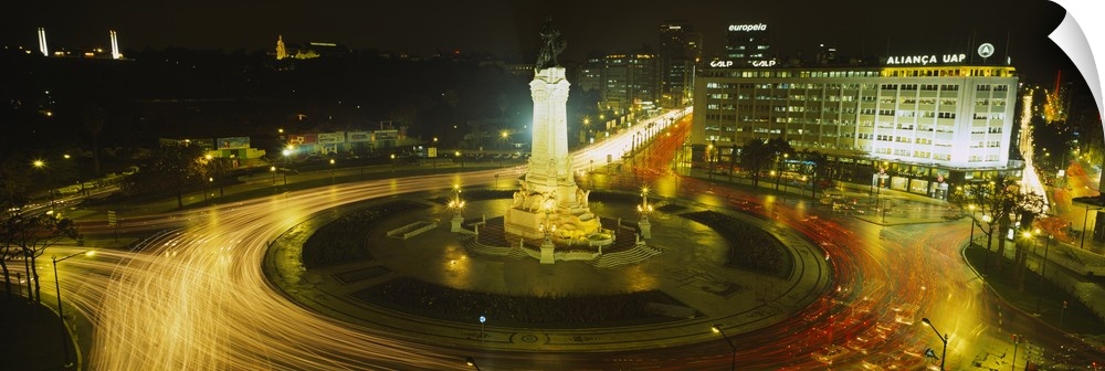 High angle view of traffic moving around a statue, Marques De Pombal Square, Lisbon, Portugal