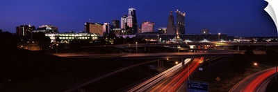 Highway interchange and skyline at dusk, Kansas City, Missouri, USA