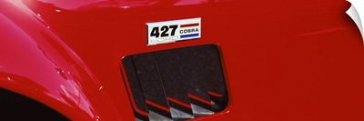Hood ornament of a 427 Cobra car
