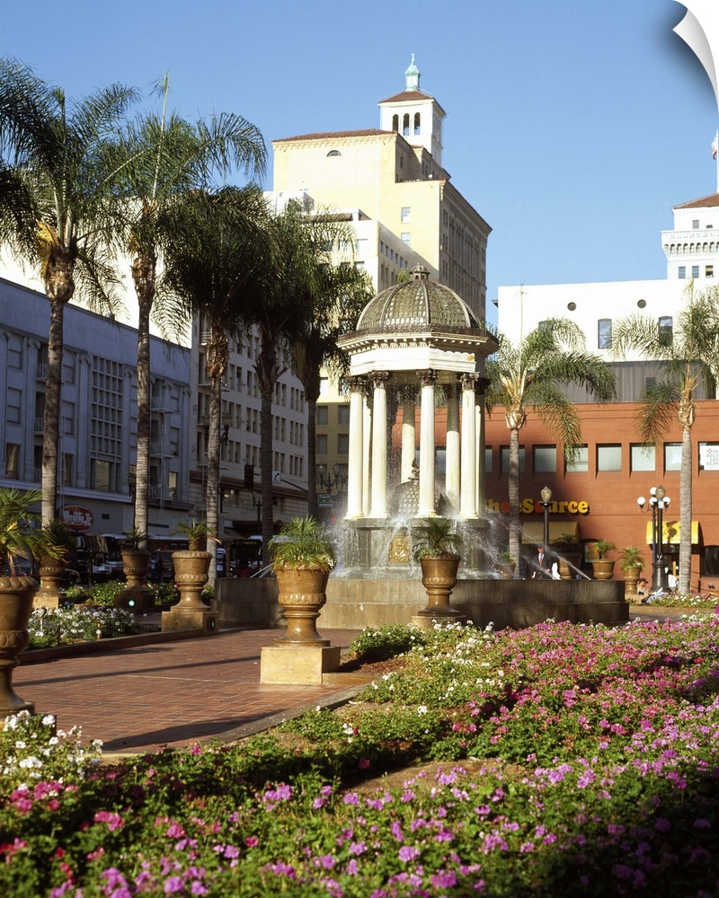 San Diego, California's Horton Plaza with flowers and palm trees.
