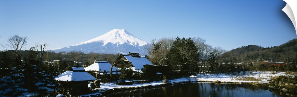 Houses in front of a mountain, Mt Fuji, Honshu, Japan