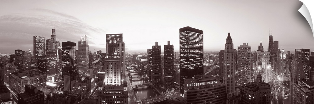 This wide angle panoramic photograph shows this Midwestern city skyline in a monochromatic tint.