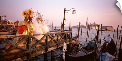 Italy, Venice, St Mark's Basin, people dressed for masquerade