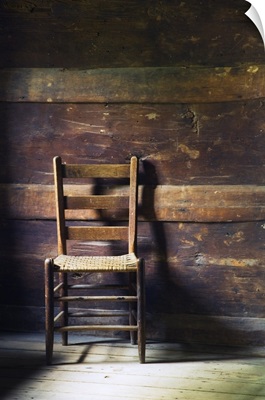 Ladderback chair in empty room, Mountain Farm Museum, Great Smoky Mountains National Park, North Carolina