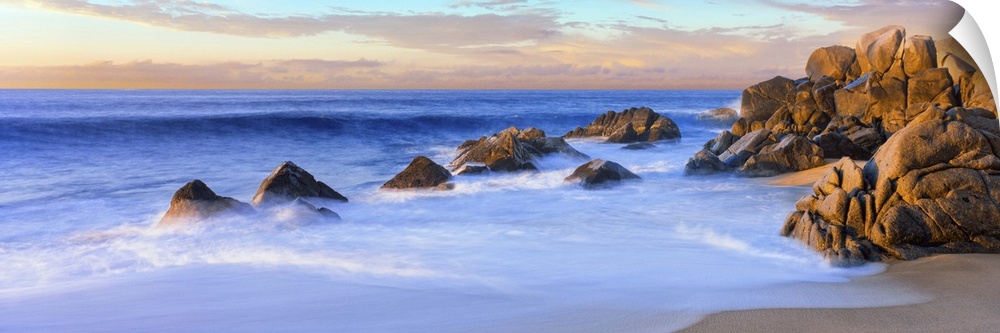 Rock formations on the beach at sunrise, Lands End, Cabo San Lucas, Baja California Sur, Mexico