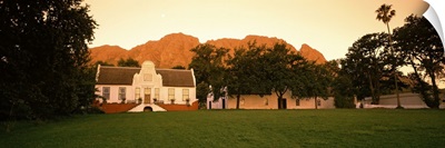 Lawn in front of a Cape Dutch Style house with a mountain and Simonsberg in the background, Stellenbosch, Cape Winelands, Western Cape Province, South Africa